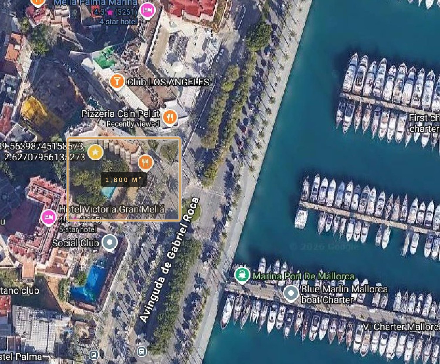 Aerial view: the site and the berths of Marina Port de Mallorca directly across the avinguda