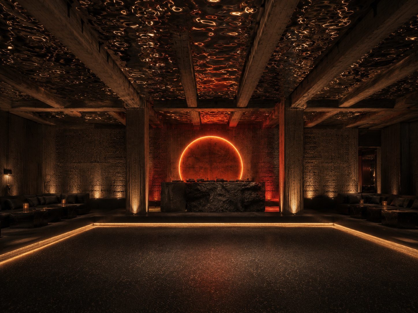 The Eclipse ring over still water in a raw concrete room